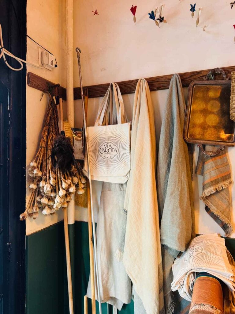 You can also find Via Carota tote bags, aprons, a feather duster, and old-fashioned brooms at Officina 1397.