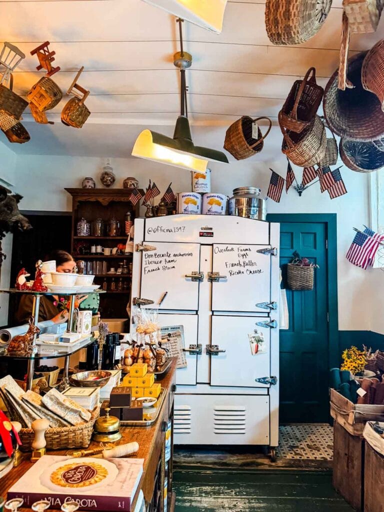 A vintage refrigerator full of fresh eggs, French butter, and Italian ricotta lines one wall inside of Officina 1397.