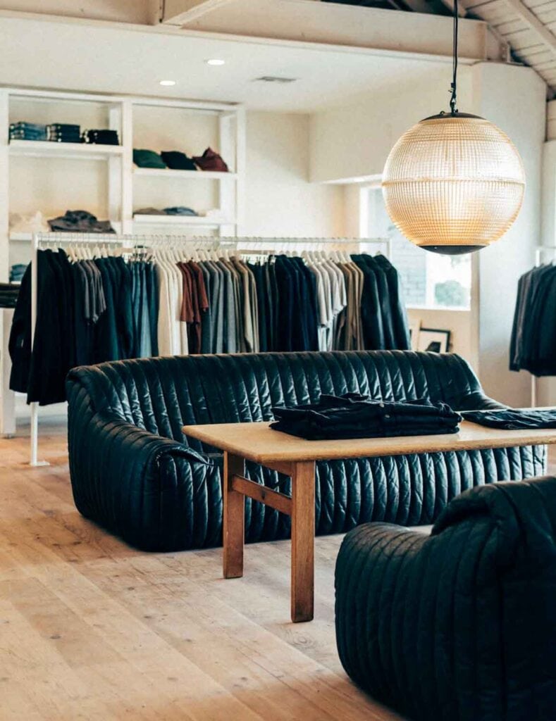 Pair of black vintage spafs in a Buck Mason shop.