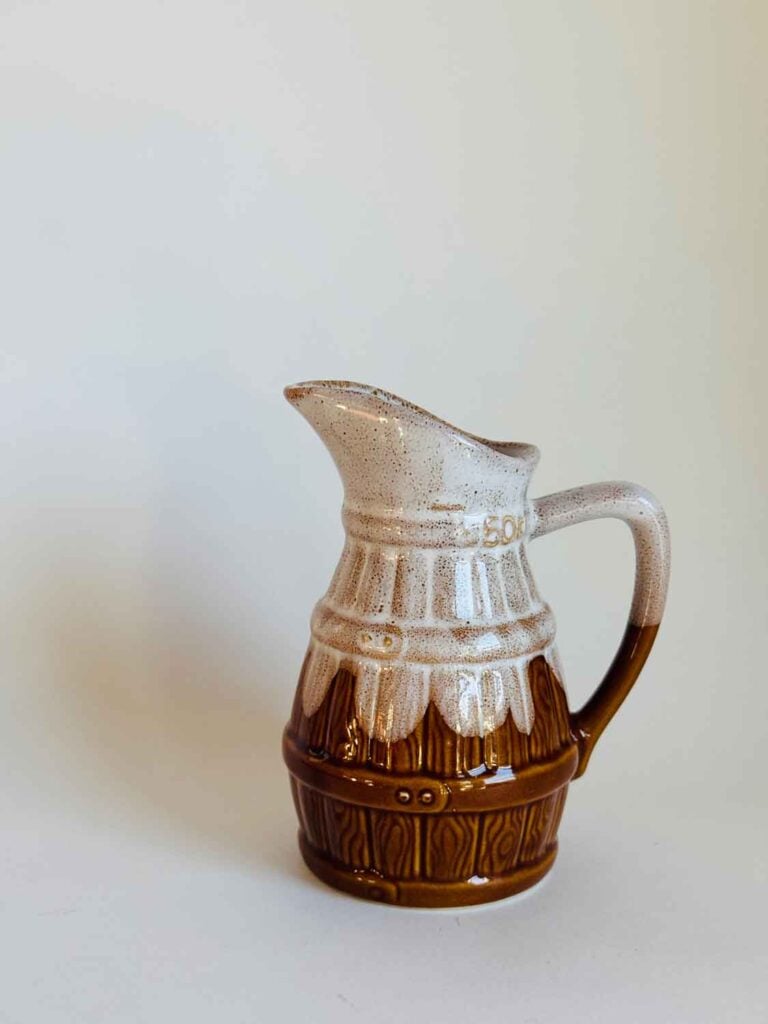 Vintage Frnech pitcher with barrel design. 